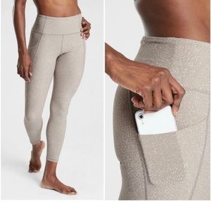 ATHLETA SALUTATION RAIN WATER STASH POCKET LEGGINGS SZ M.